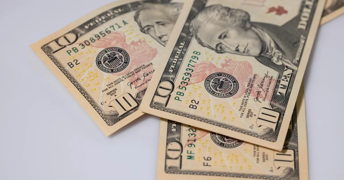 Dólar anestesiado: Fed e Copom seguram a moeda nos R$ 5,20